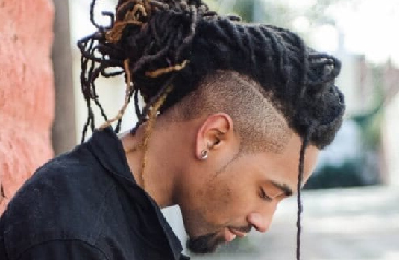 Young man with dread locs