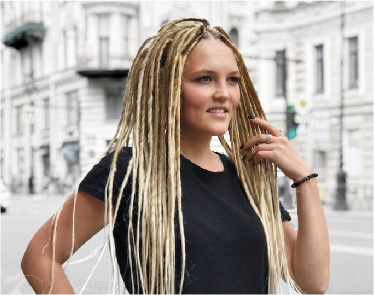 White woman with dreads